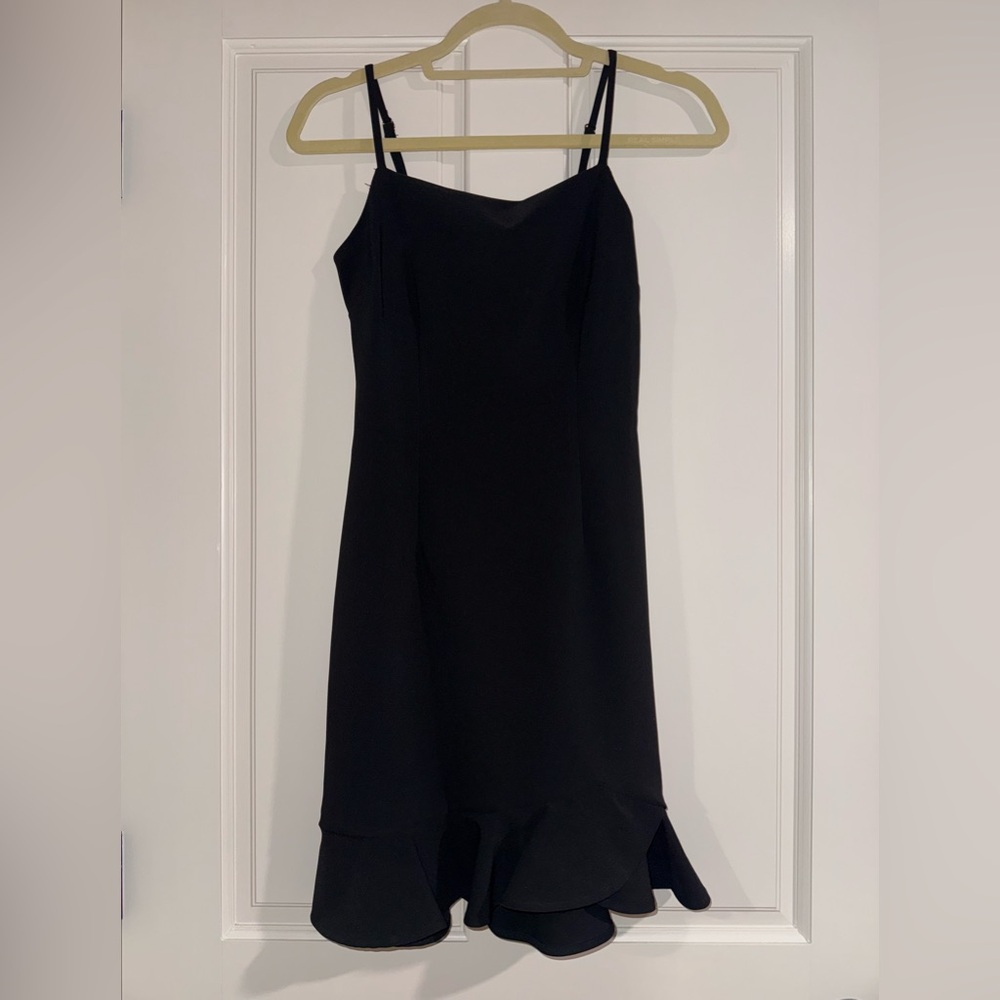 Mackenzie & Me black spaghetti strap cocktail dress with a flounce hemline